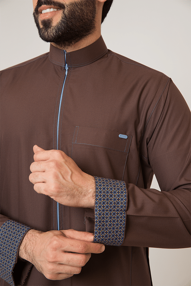 Brown re-thobe with a colorful zipper