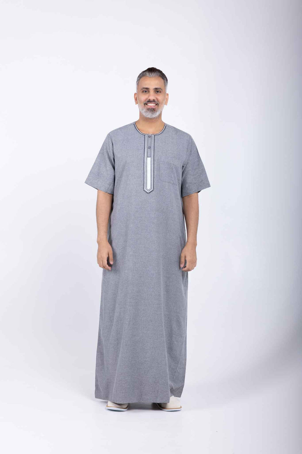 Men's light grey jalabiya with embroidered details, Arab style