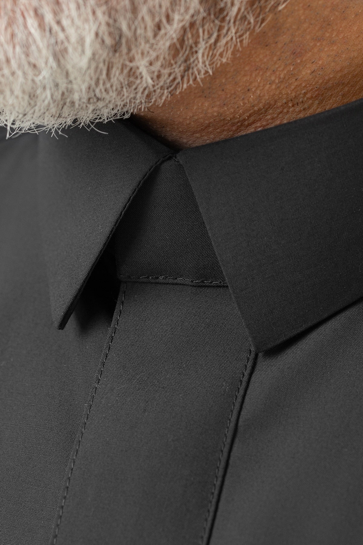 Black business suit, lapel collar
