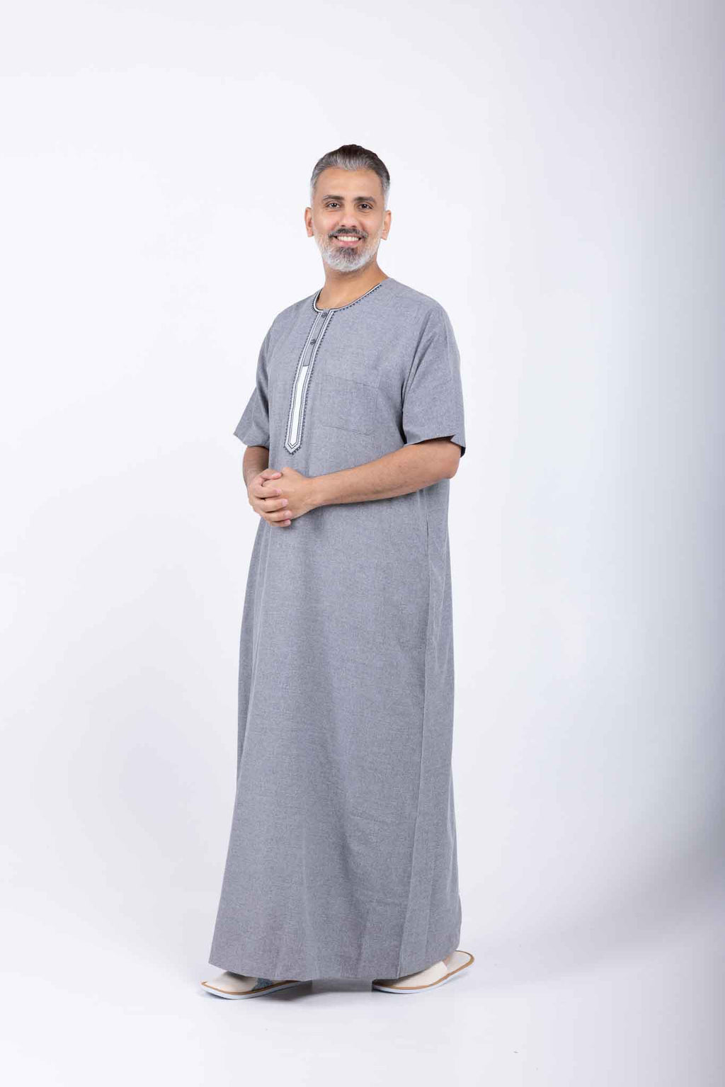 Men's light grey jalabiya with embroidered details, Arab style